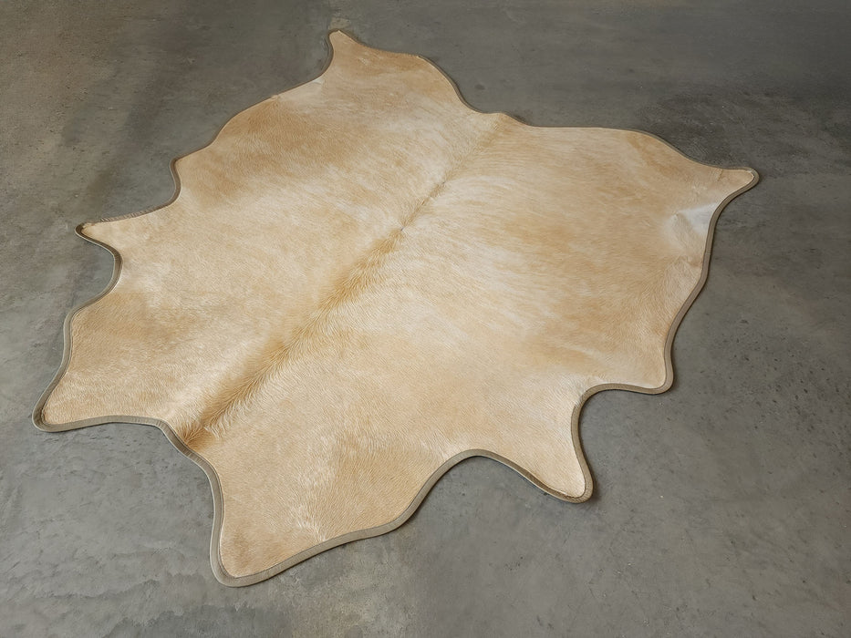 Palomino Exotic Cowhide Rug w/ Leather Binding Size 6.9 X 7.3 ft
