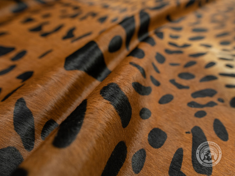 Amazon Jaguar on Caramel Cowhide Rug