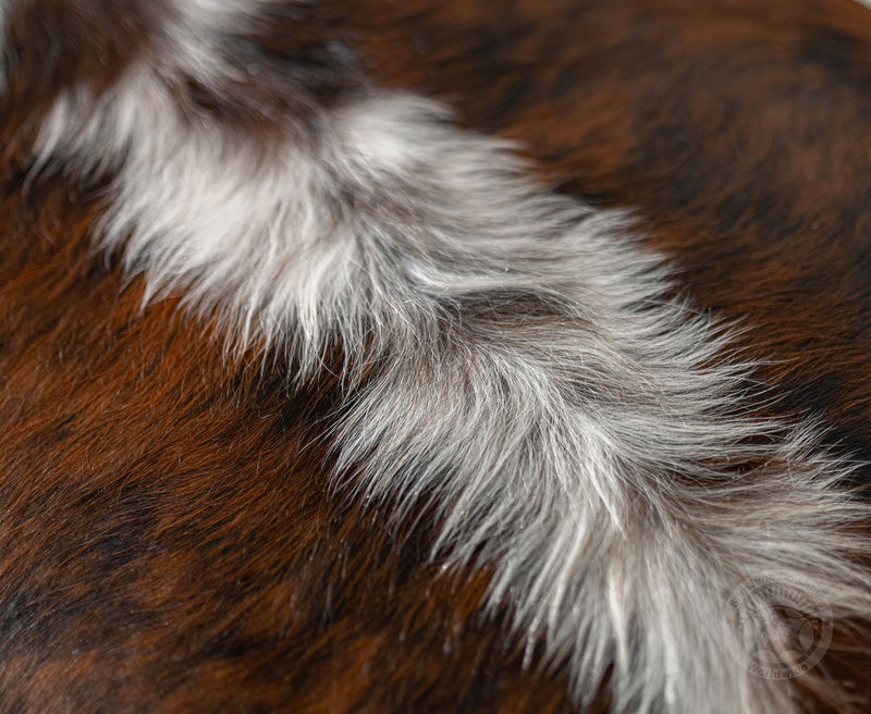 Cowhide Ottoman Footstool with Wooden Legs - Backbone