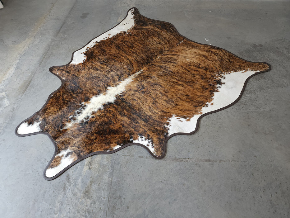 Brindle Light Cowhide Rug w/ Leather Binding Size 6.8 X 7.3 ft