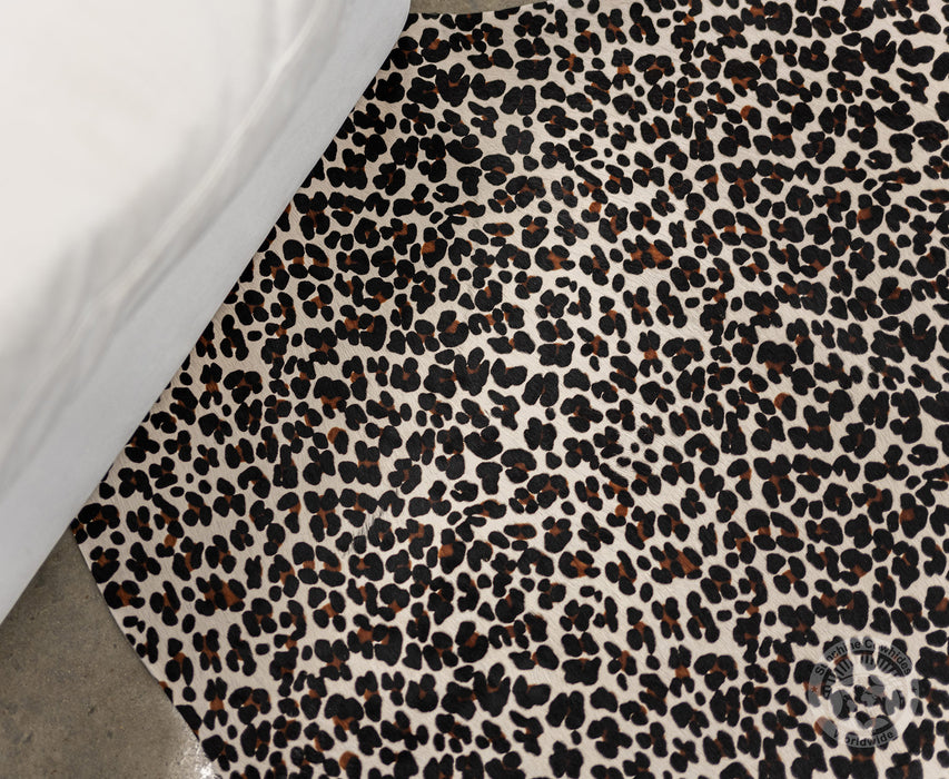 Jaguar on Off White Cowhide Rug