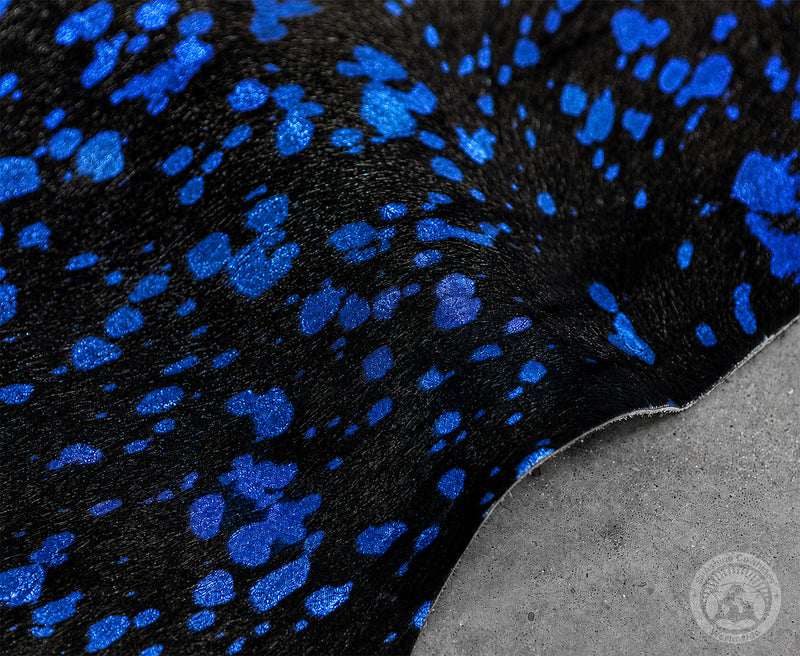 Devore Metallic Blue on Dyed Black Cowhide Rug