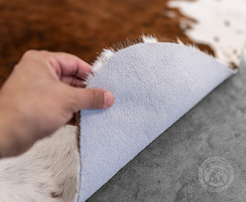 Brindle Tricolor White Belly Cowhide Rug