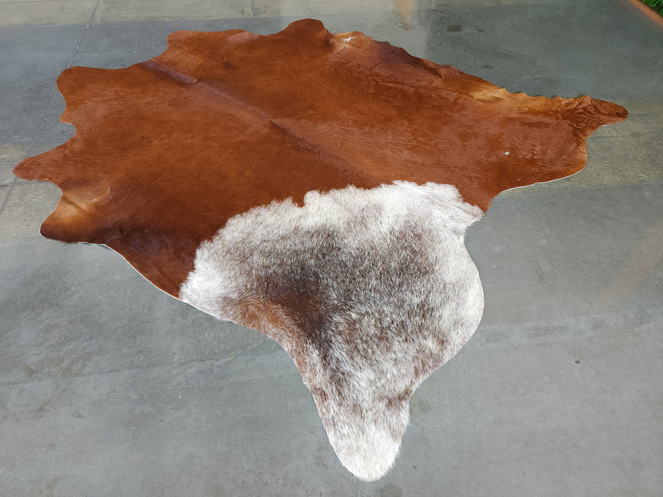 Premium Brazilian Brown and White Exotic Cowhide Rug Size 7.4 X 8.6 ft
