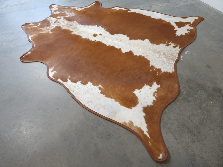 Hereford Cowhide Rug w/ Leather Binding Size 7.1 X 7.3 ft
