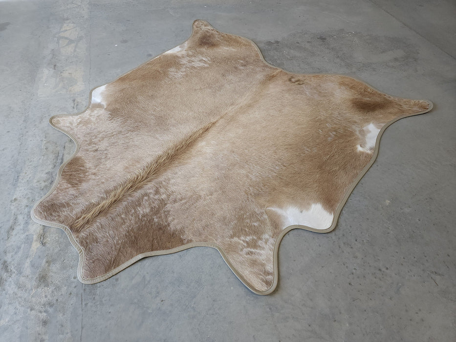 Taupe Exotic Cowhide Rug w/ Leather Binding Size 6.10 X 7.2 ft