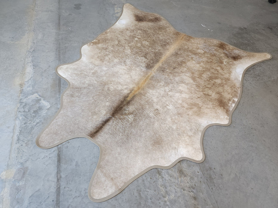 Taupe Exotic Cowhide Rug w/ Leather Binding Size 6.10 X 7.7 ft