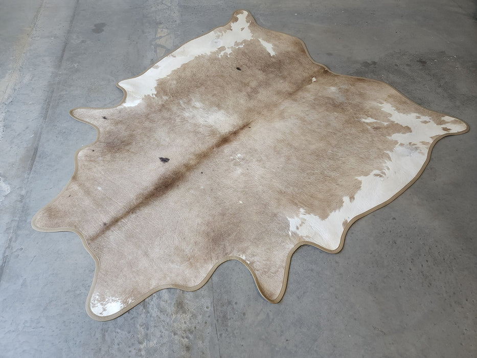 Taupe Exotic Cowhide Rug w/ Leather Binding Size 7.4 X 8.4 ft