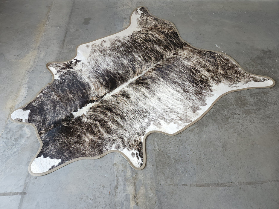 Brindle White Backbone Cowhide Rug w/ Leather Binding Size 6.9 X 7.6 ft