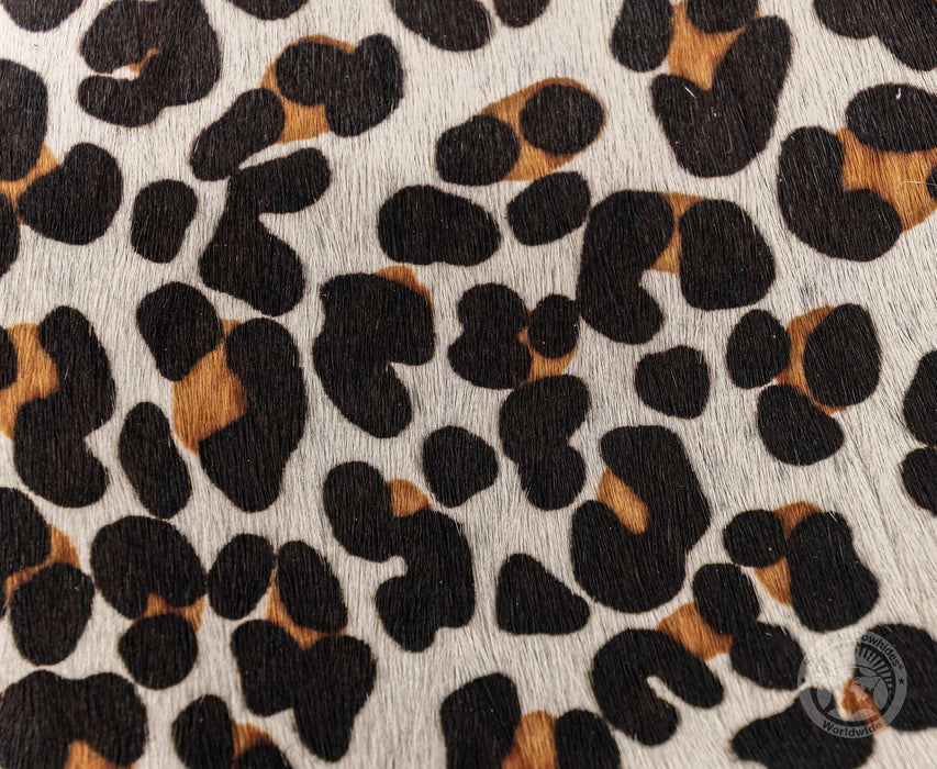 Jaguar on Off White Cowhide Rug