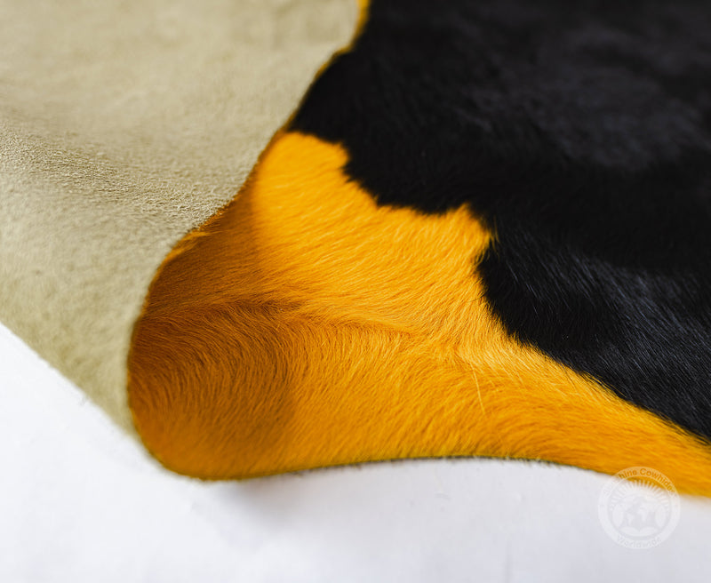 Dyed Yellow on Black Cowhide Rug