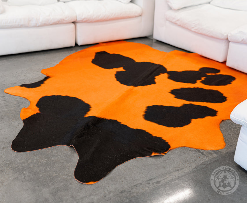 Dyed Orange on Black Cowhide Rug