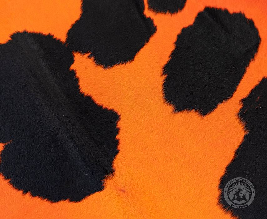 Dyed Orange on Black Cowhide Rug