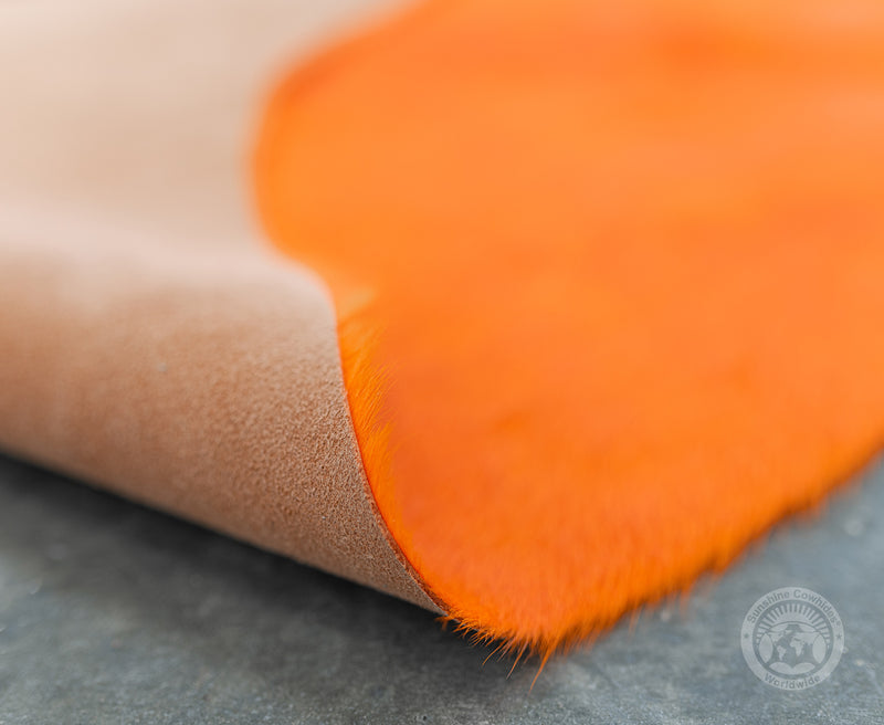 Dyed Orange on Black Cowhide Rug