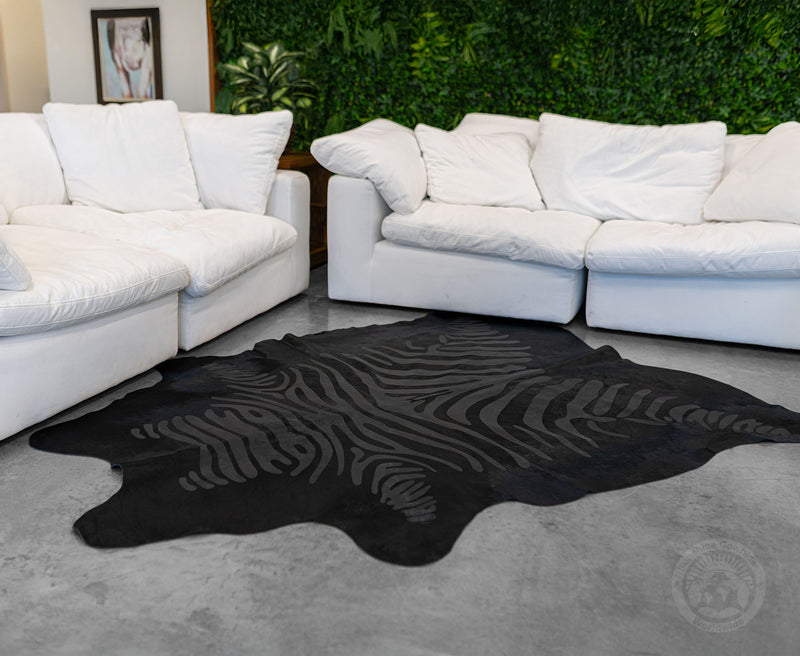 Zebra Acid Wash on Dyed Black Cowhide Rug