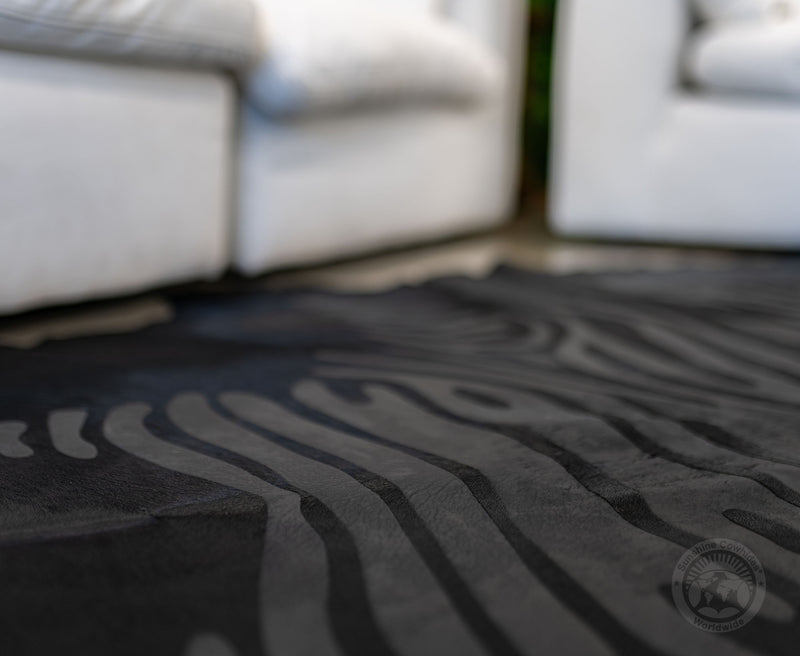 Zebra Acid Wash on Dyed Black Cowhide Rug