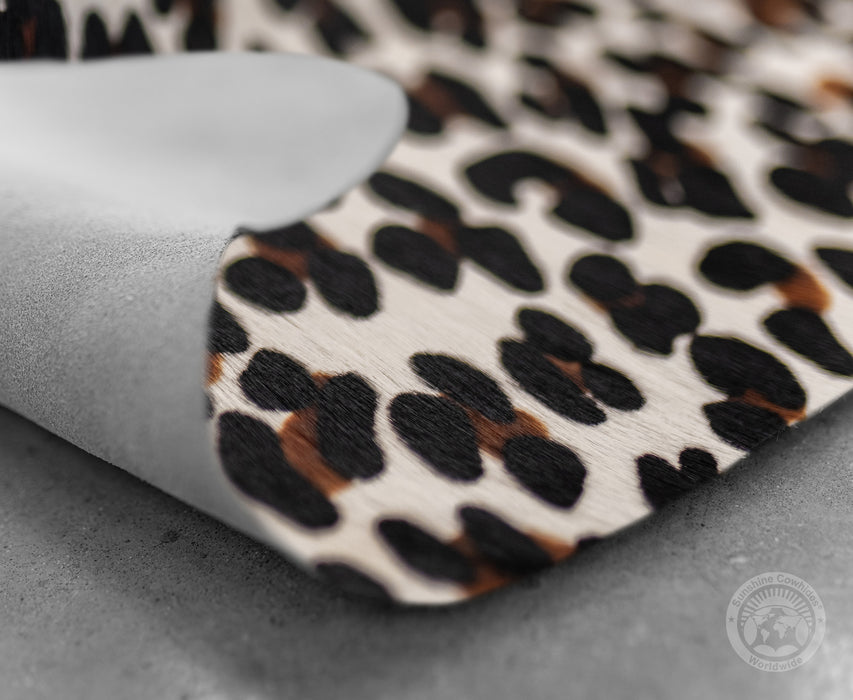 Jaguar on Off White Cowhide Rug