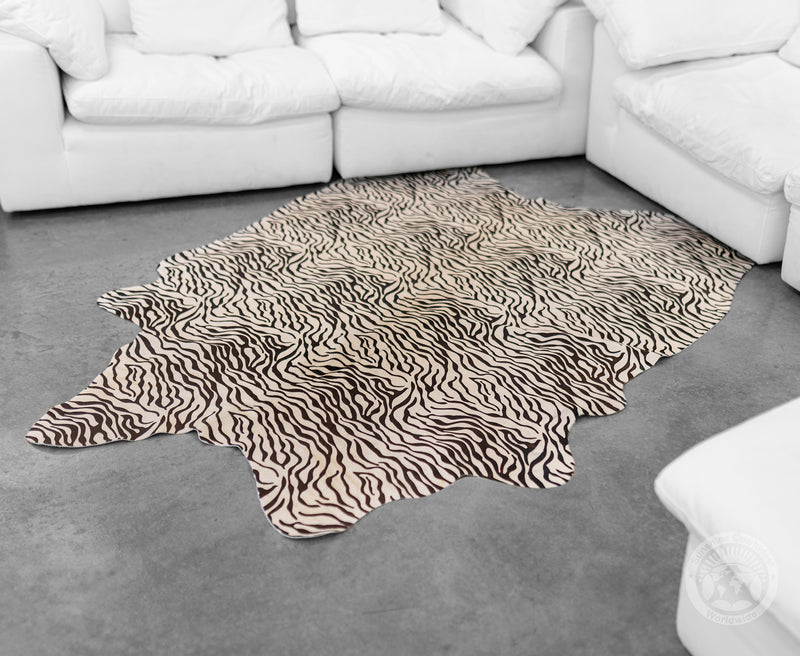 Off White Cowhide Rug Baby Zebra on Off White Cowhide Rug — Luxury Cowhides