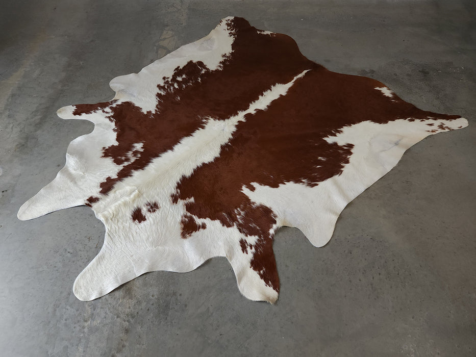 Premium Brazilian Hereford Brown and White Cowhide Rug Size 7.6 X 8.4 ft