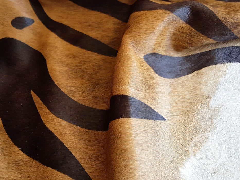 Zebra Black Stripes on Caramel Cowhide Rug
