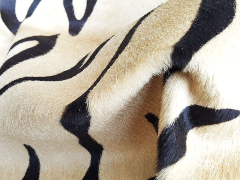 Tiger on Beige Cowhide Rug