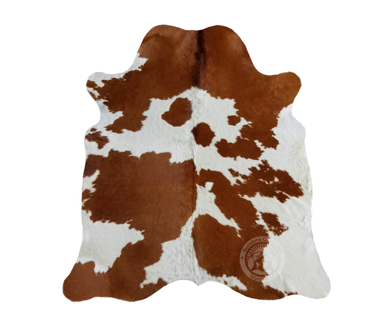 Brown and White Cowhide Rug