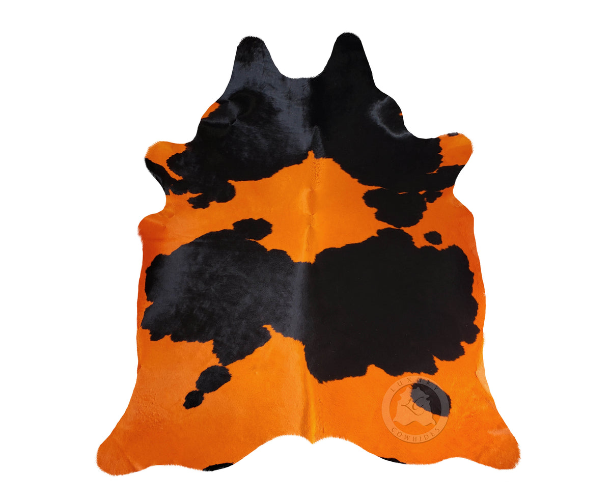 Dyed Orange on Black Cowhide Rug — Luxury Cowhides