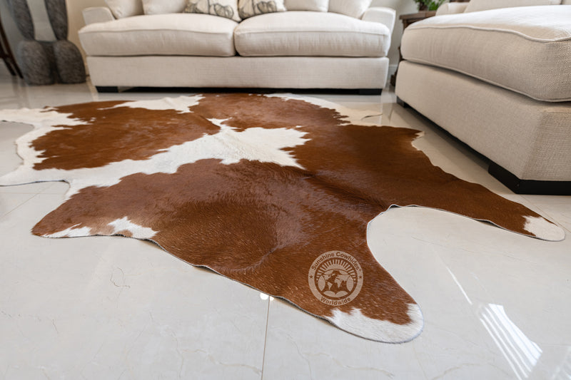 Brown and White Cowhide Rug