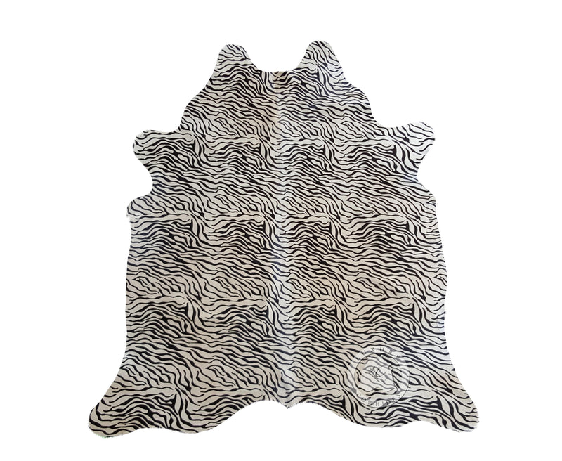 Baby Zebra on Off White Cowhide Rug