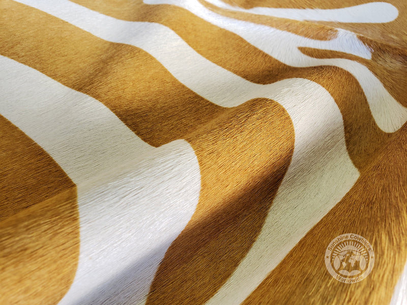 Off White Cowhide Rug Zebra Beige on Off White Cowhide Rug — Luxury Cowhides