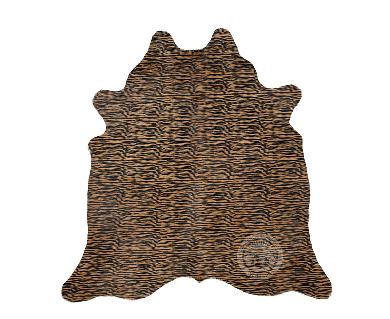 Baby Tiger on Caramel Cowhide Rug